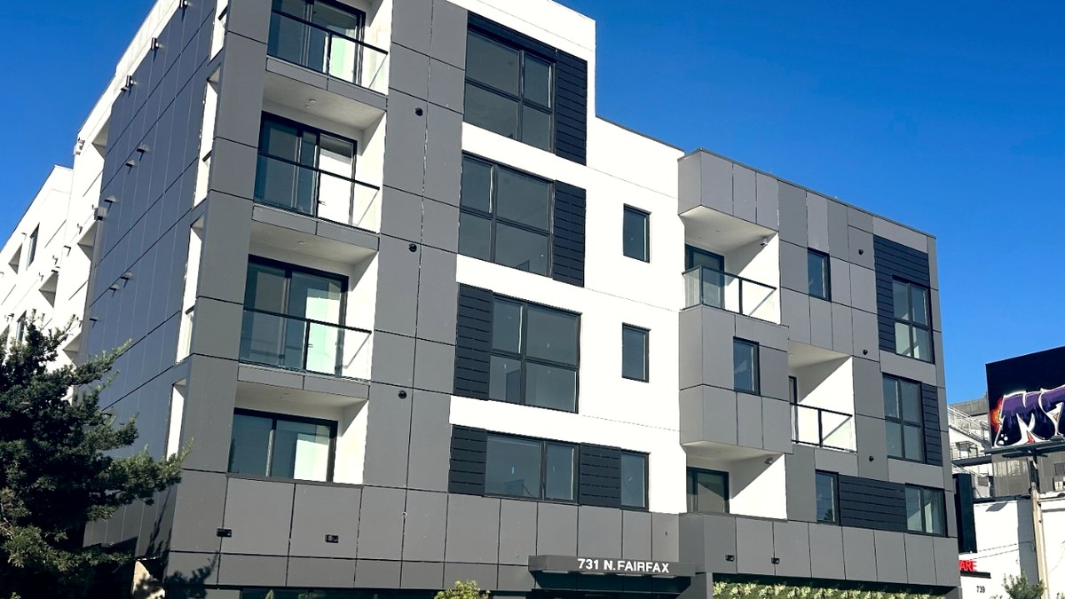 The Felix on Fairfax — a five-story grey-and-white multifamily building at 731 N Fairfax Avenue, Los Angeles.